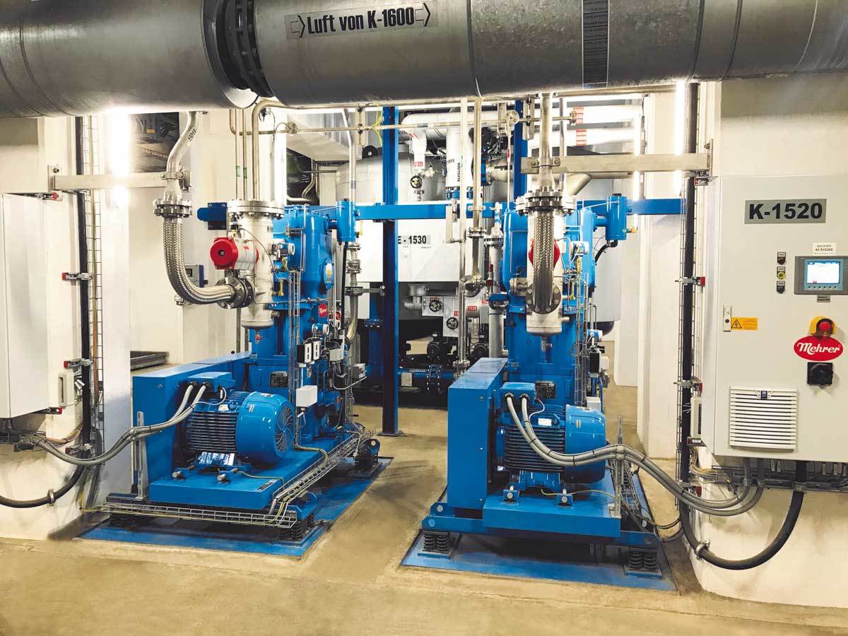 Two piston compressors that are used for air separation.